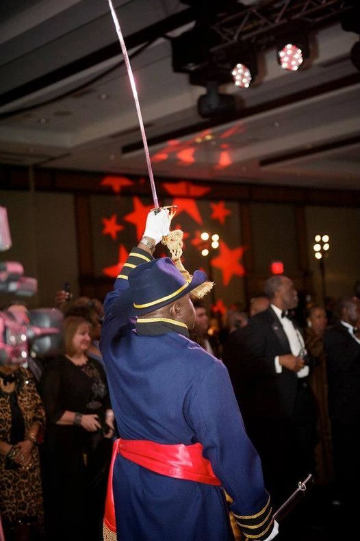 Ceremonial military guard with raised sword